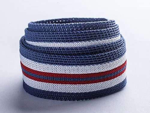 Striped tape roll showing the woven edge